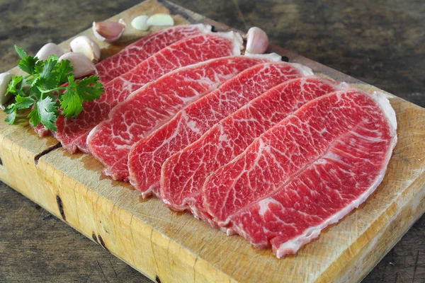 Slide chuck beef preparation for cooking — Stock Photo, Image