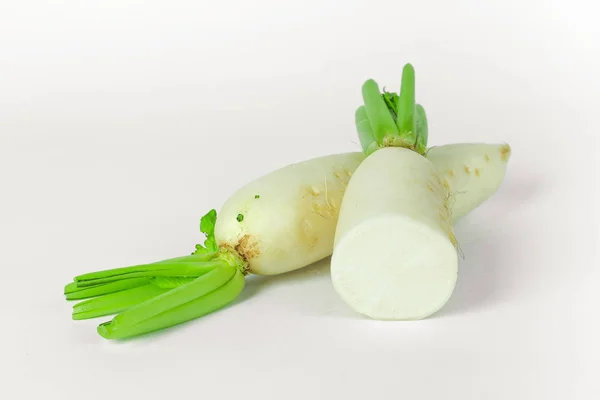 Fresh slices white radish on wooden background, healthy vegatable — Stock Photo, Image