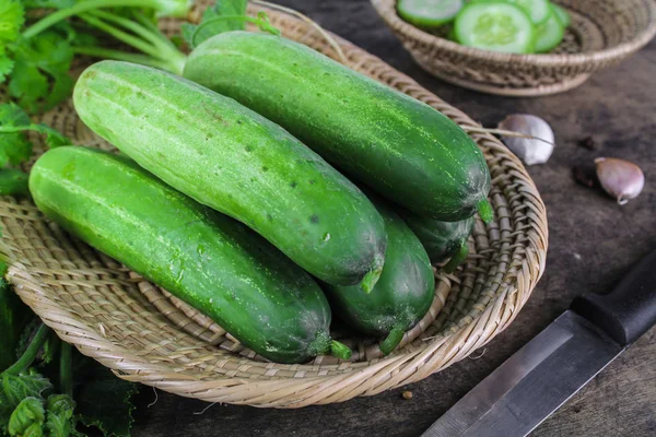 Fresh cucumber on wooden background, raw organic vegetable — Stock Photo, Image