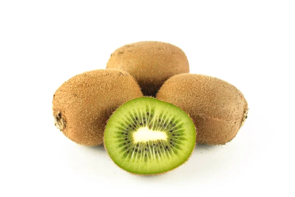 Kiwi entero y rebanado, comida sana, frutas tropicales —  Fotos de Stock