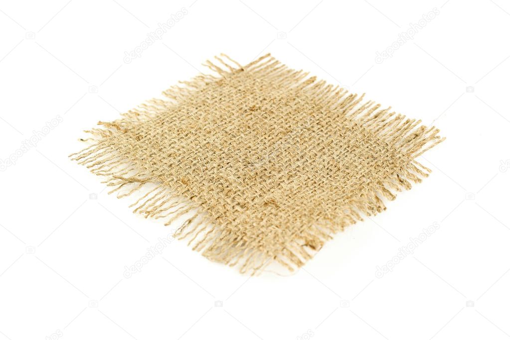 Hessian sack tied with string from low perspective isolated against white background