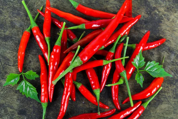 Red chili and chili powder on white background