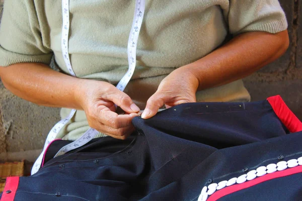 Women are sewing, tribal dress, Phuthai dress