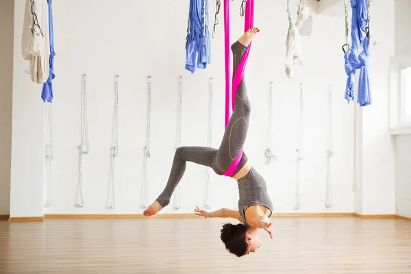stock image Star Inversion aerial antigravity yoga pose, woman exerciseses with hammock