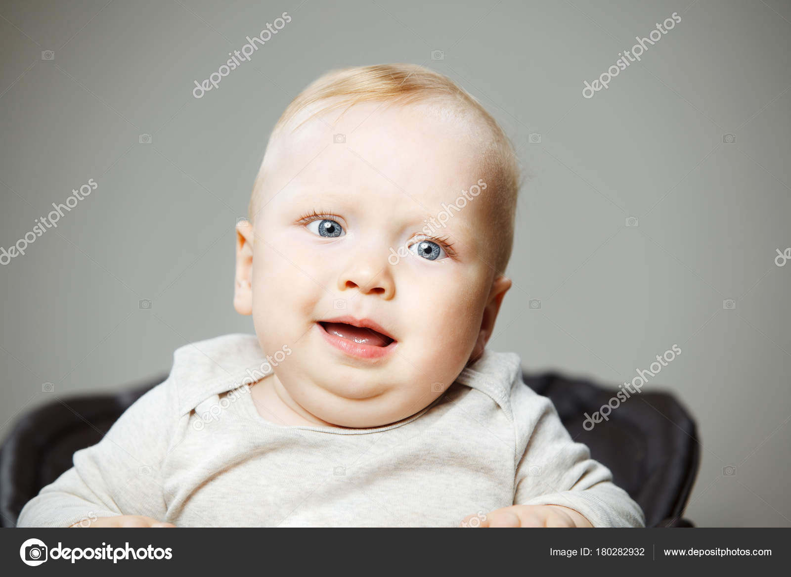 Baby boy with confused face expression portrait photo Stock Photo by ©il21  180282932