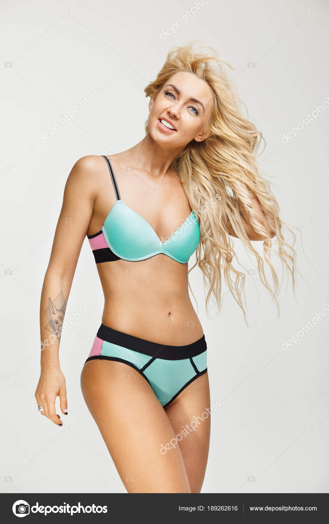 Smiling Beautiful Woman With Blond Hair Wears Bikini On White Isolated Background Swimwear Season Stock Photo C Il21