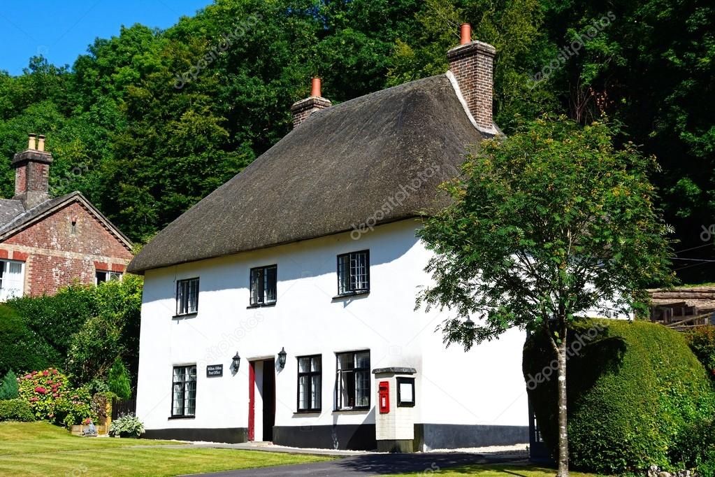 View of the thatched post office along the main village street, Milton Abbas.