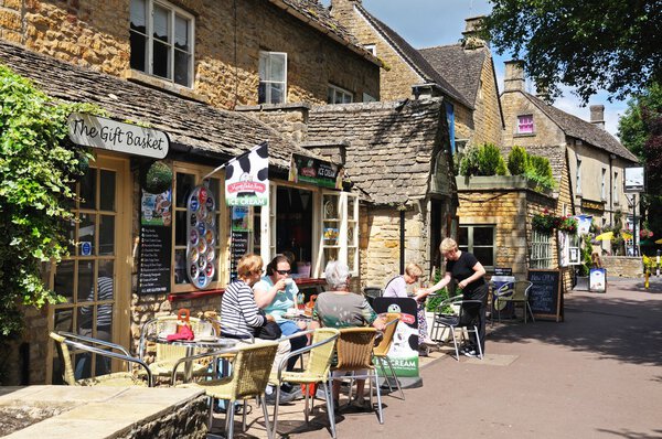 Pavement cafe in the village centre, Bourton on the Water.