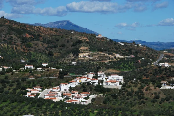 Cluster of houses and surrounding countryside on the edge of town, Monda, Spain. — Stockfoto