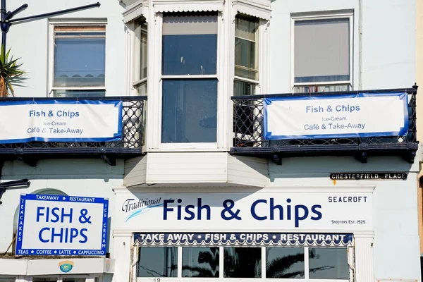 Traditional fish and chips shop signs along the Esplanade, Weymouth. — Stock Photo, Image