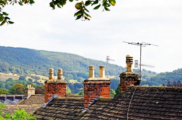 Cottage rooftops with chimney pots, Bakewell, UK. — Stock Photo, Image