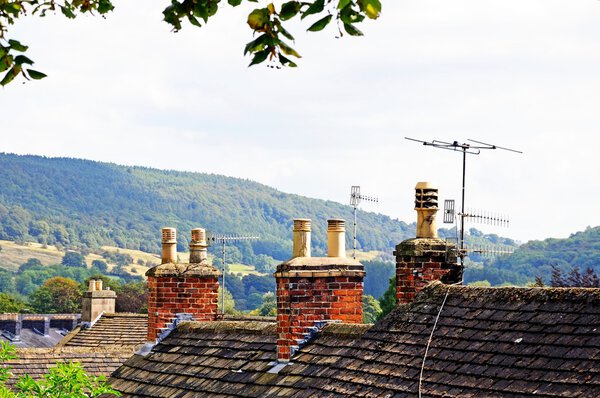Cottage rooftops with chimney pots, Bakewell, UK.