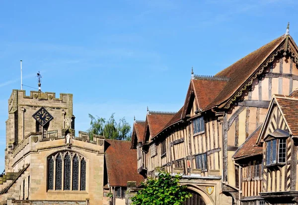View of the Lord Leycester Hospital and St James Chapel along High Street, Warwick, UK.
