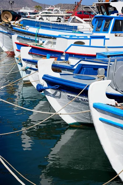 Traditional Greek fishing boats moored in the harbour, Elounda, Crete. — Stock Photo, Image