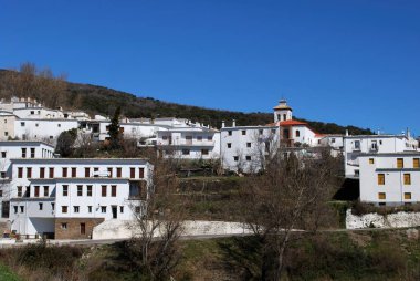 View of white village, Portugos, Spain. clipart