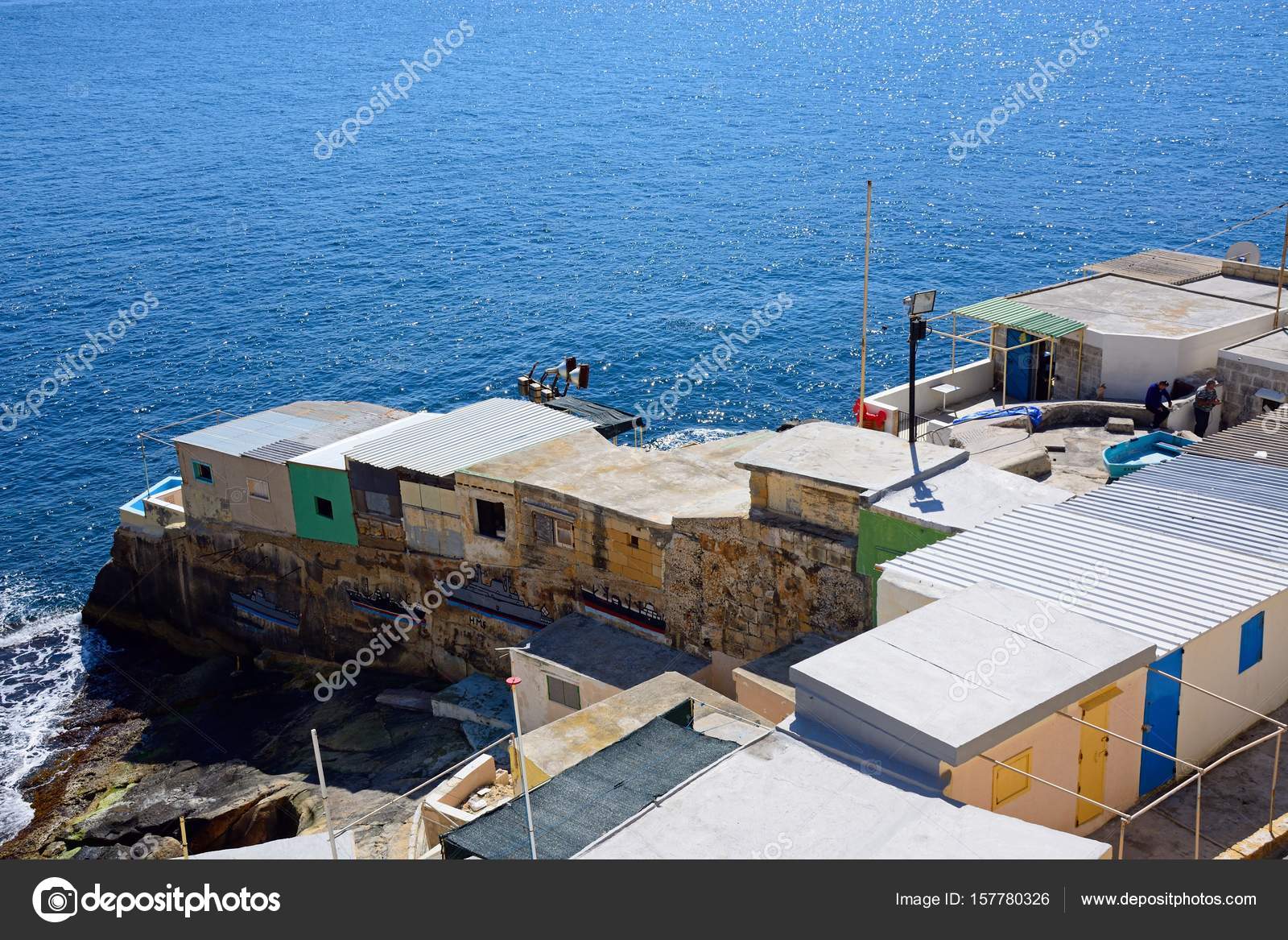 Fishermens Cabins Along Triq Il Mediterran By The Shoreline