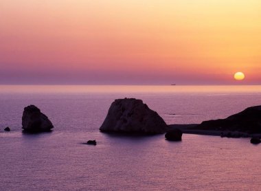 Aphrodite's rock at sunset, Petra Tou Romiou, Cyprus. clipart