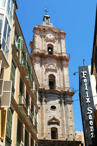 MALAGA, SPAIN - JULY 11, 2008 - View of St John the Baptist church tower in the city centre, Malaga, Malaga Province, Andalucia, Spain, Western Europe, July 11, 2008