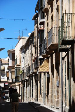 Old stone houses in a narrow street, Ubeda, Spain.