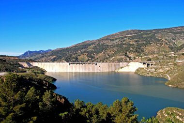 View of the reservoir and dam near Velez Bonaudalla, Las Alpujarras, Granada Province, Andalusia, Spain, Europe. clipart