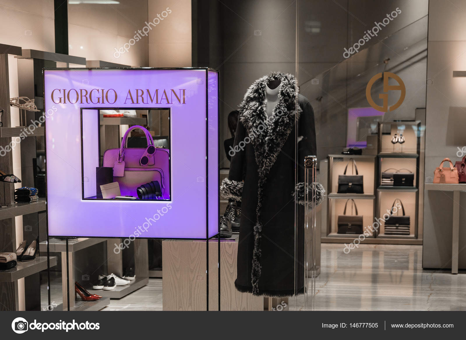 Milan, Italy - October 9, 2016: Shop window of a Giorgio Armani shop in  Milan - Galleria Vittorio