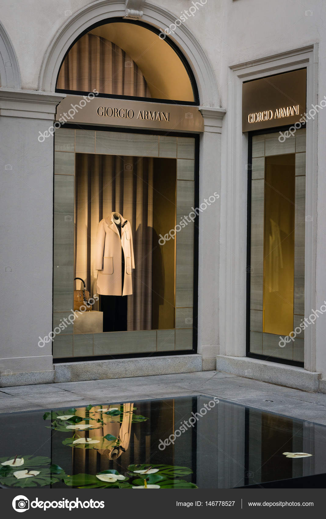 Milan, Italy - October 8, 2016: Shop window and entrance of a Louis Vuitton  shop in Milan - Montenapoleone street, Italy. Few days after Milan Fashion  Stock Photo - Alamy