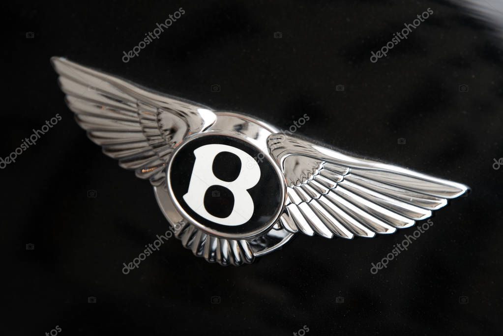 Milan, Italy - February 27, 2017 - Bentley car logo on a dark Bentley car.
