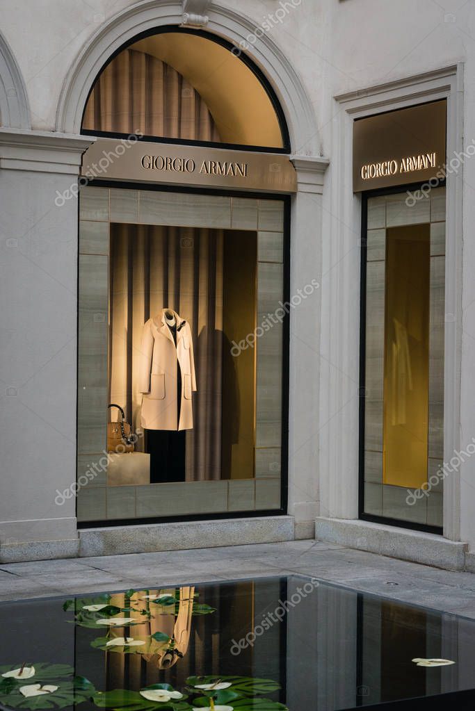 Milan, Italy - October 8, 2016: Side courtyard of a Giorgio Armani shop in Milan - Montenapoleone street, Italy. Few days after Milan Fashion Week. Fall Winter 2017 Collection. High end label of Armani fashion house founded in 1975 by Giorgio Armani.