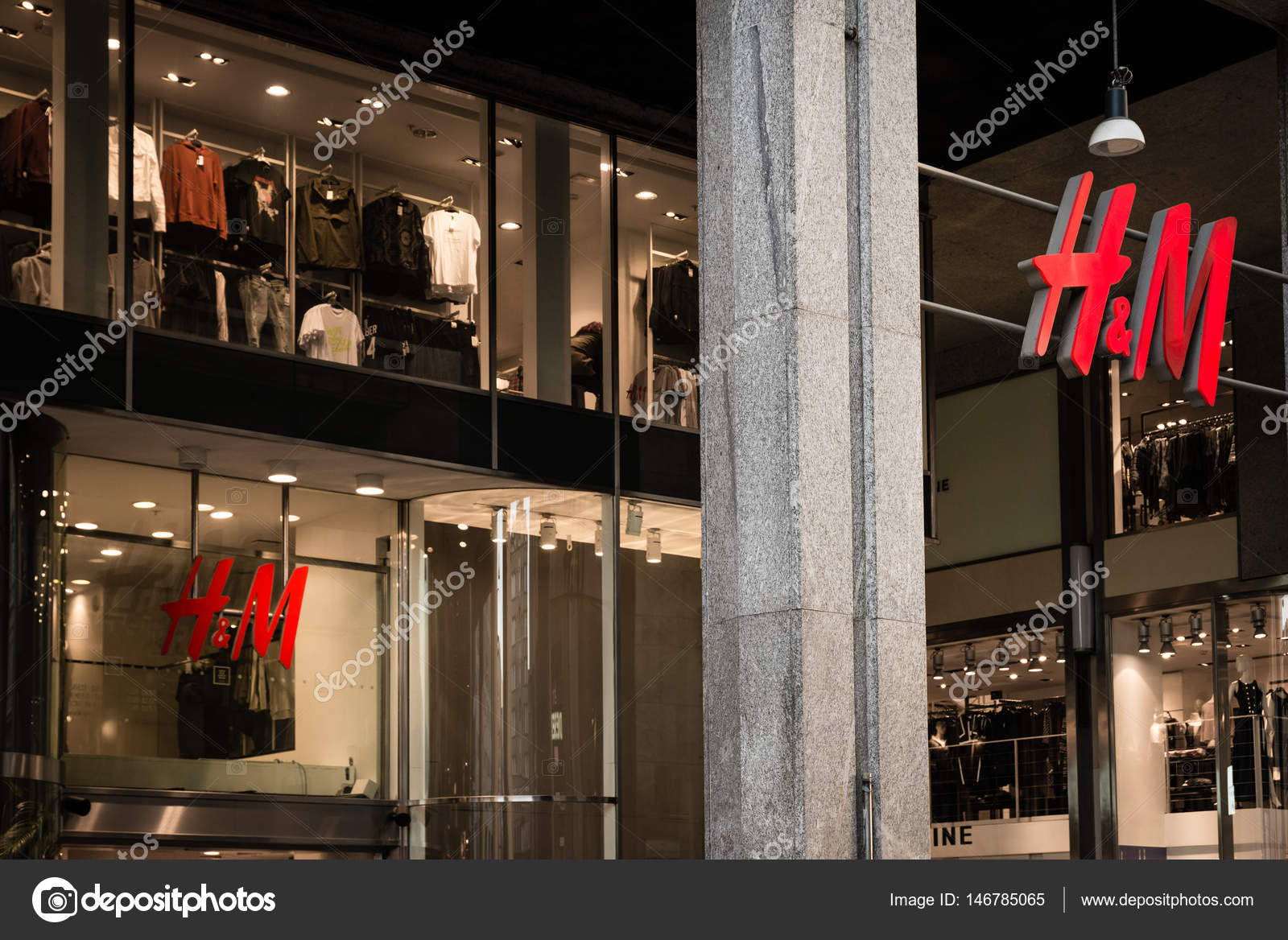 Milan Italy October 9 2016 Shop window and entrance of a H M