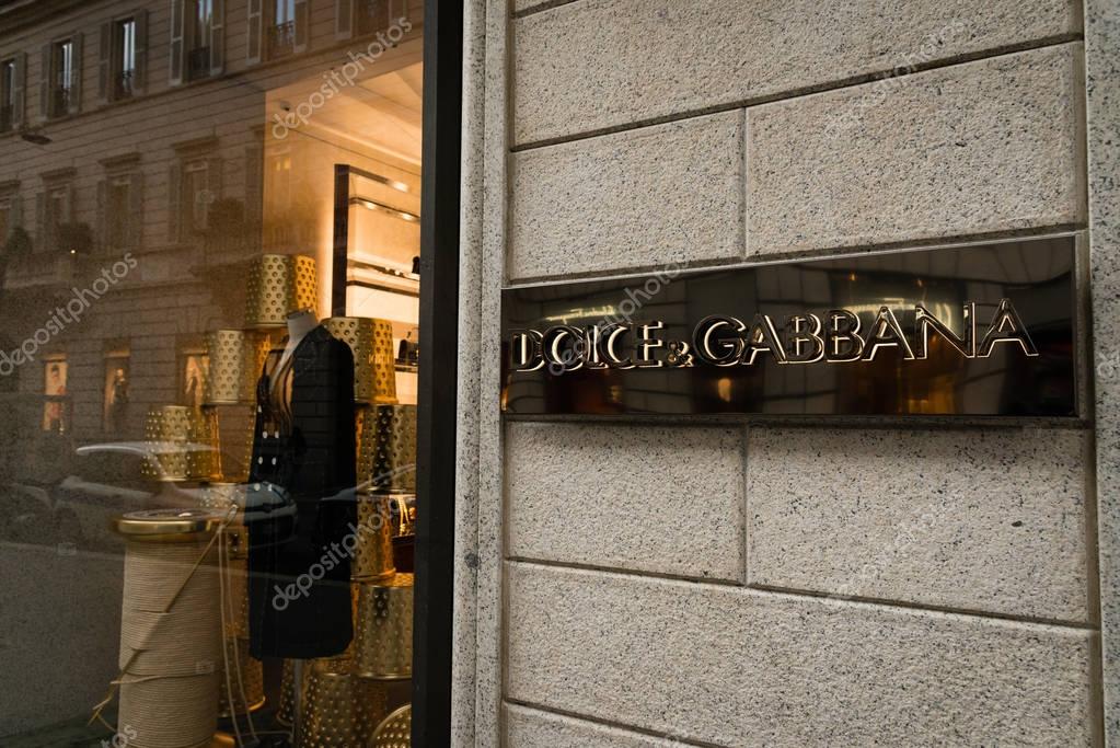 Milan, Italy - October 9, 2016: Shop window and entrance of a Dolce & Gabbana shop in Milan - Montenapoleone street, Italy. Few days after Milan Fashion Week. Fall Winter 2017 Collection.