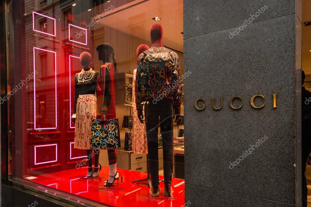 Milan, Italy - October 9, 2016: Shop window and entrance of a Gucci shop in Milan - Montenapoleone street, Italy. Few days after Milan Fashion Week. Fall Winter 2017 Collection.