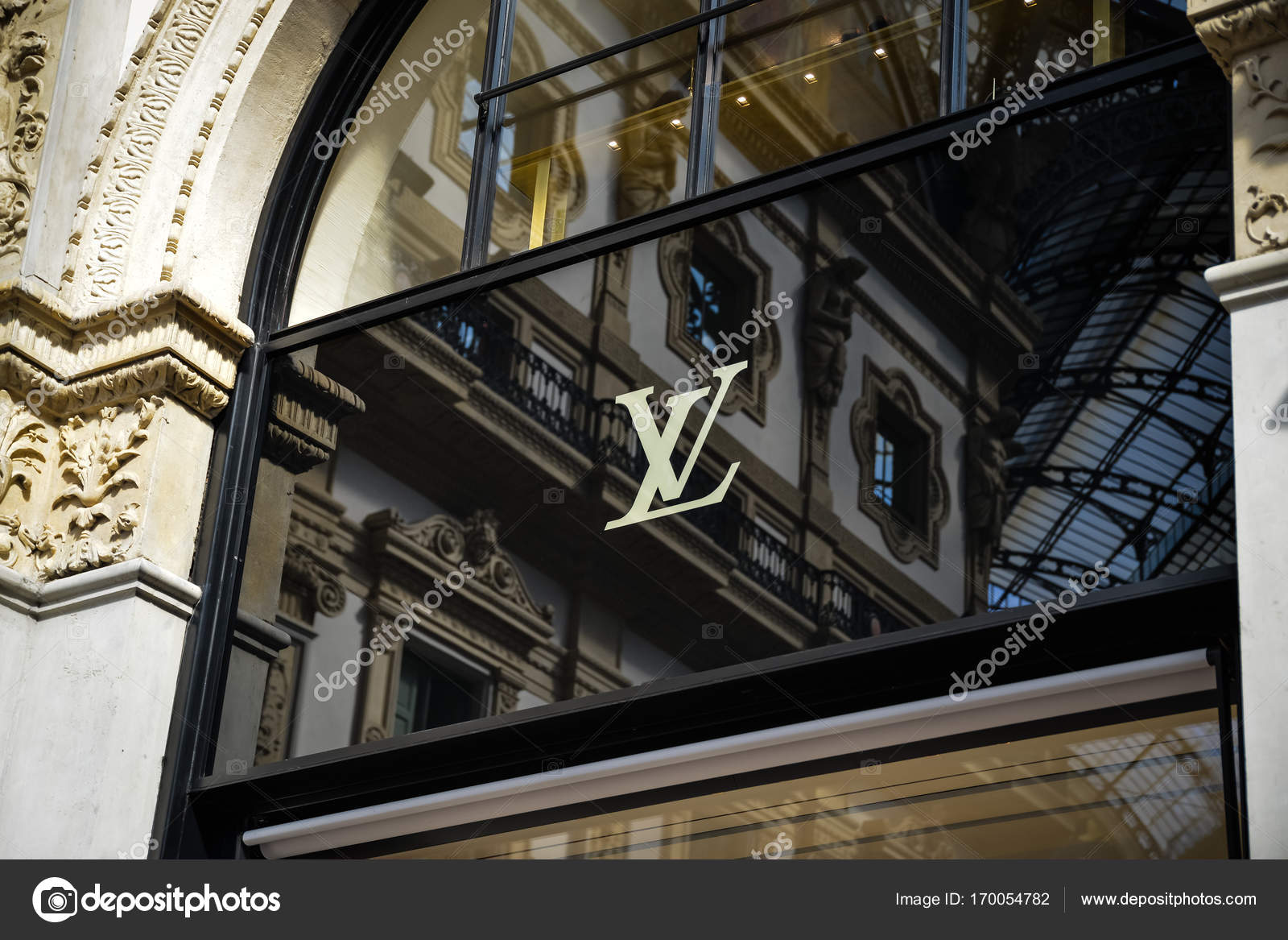 SHOPPING: Louis Vuitton Boutique, Milan, Italy Editorial