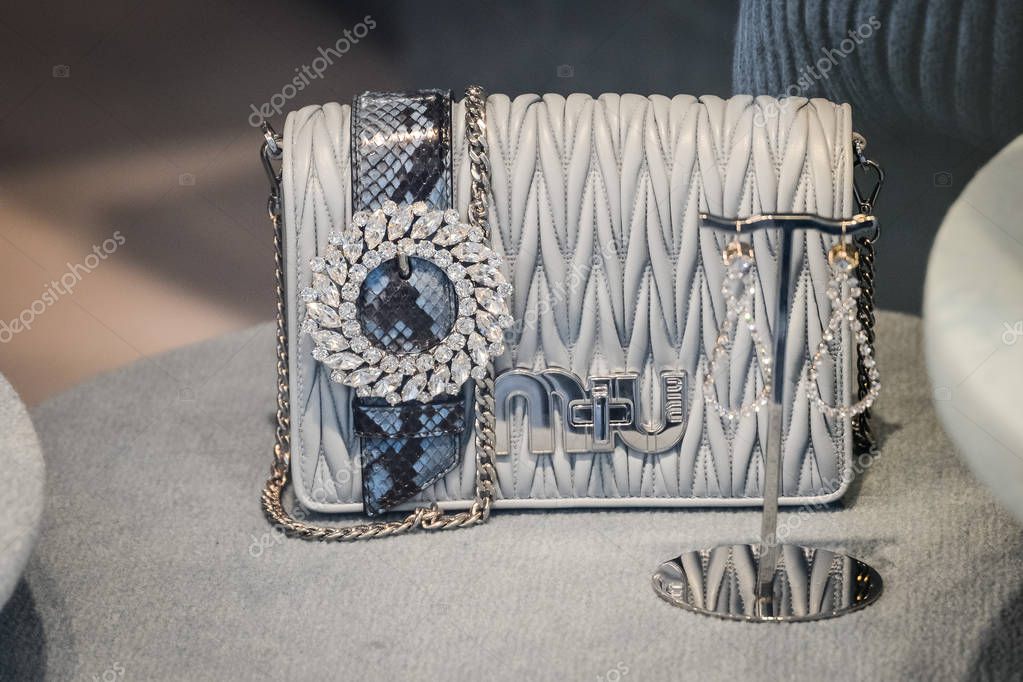 Milan, Italy - September 24, 2017:  Miu Miu store in Milan. Fashion week Miu Miu shopping