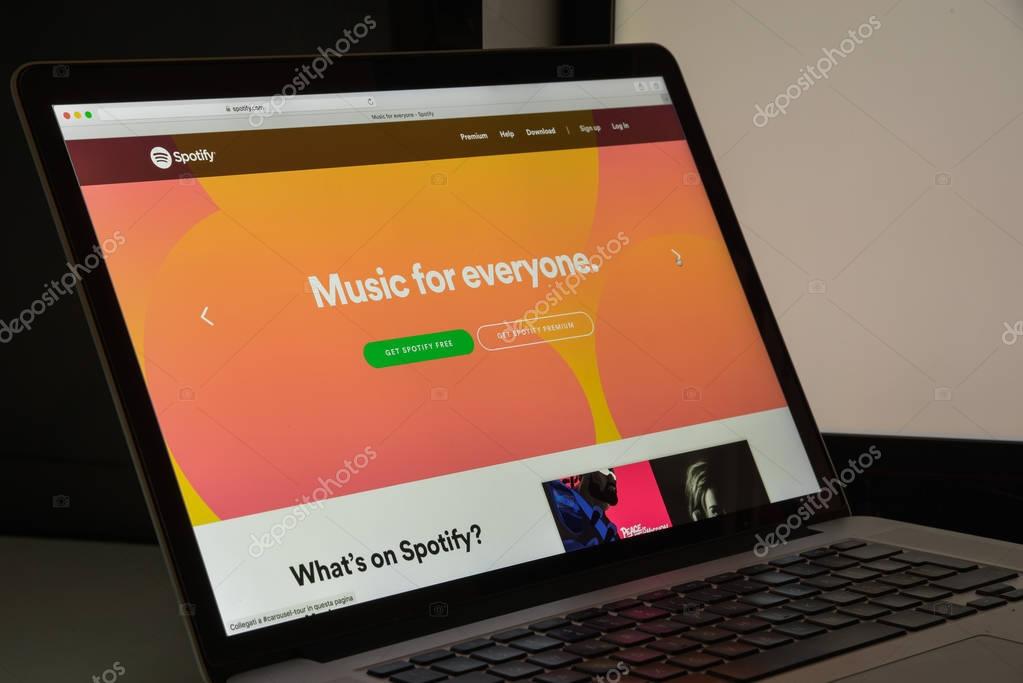 Milan, Italy - August 10, 2017: Spotify website homepage. It is a music, podcast, and video streaming service. Spotify logo visible.