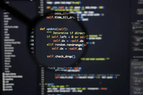Справжній Python розвивається екран код. Анотація програмування робочого циклу — стокове фото