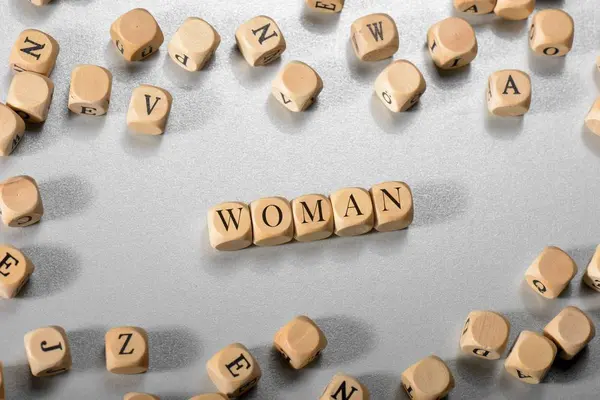 Woman word on wooden cubes. Woman concept — Stock Photo, Image