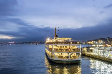 eminonu,istanbul,turkey-february 13,2020. Eminonu pier and waiting city lines ferry at blue hours in the morning