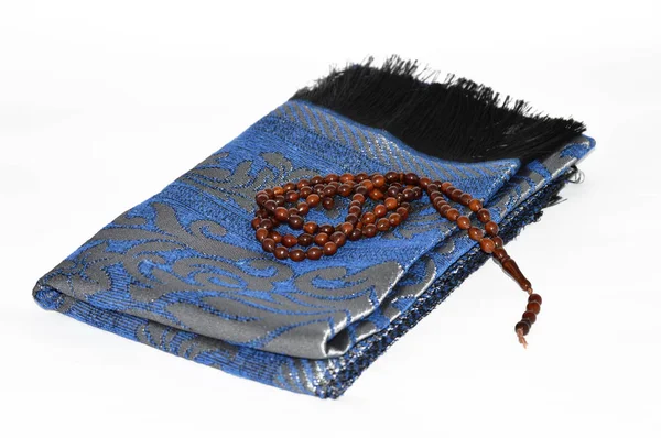 Karpet doa dan gambar-gambar rosario untuk situs-situs keagamaan dan agensi-agensi periklanan — Stok Foto