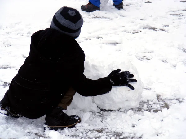 Snow, snow ball and children\'s pictures playing snowball