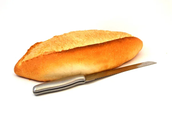 Bread and bread knife pictures — Stock Photo, Image