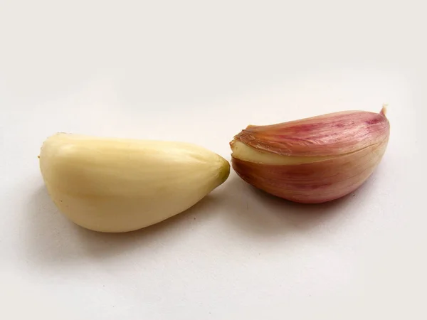 Gambar stok makro tunggal dan banyak bawang putih — Stok Foto