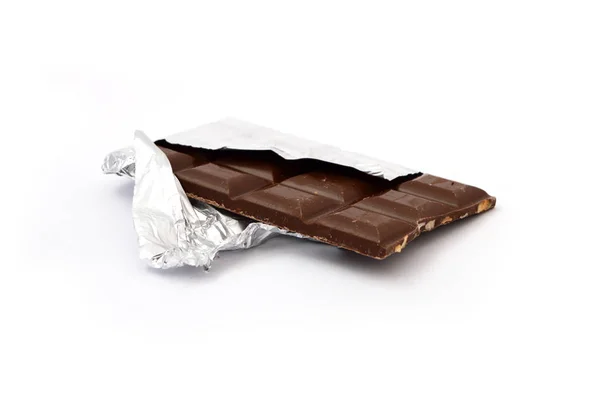 Hazelnut chocolate pictures on white floor — Stock Photo, Image