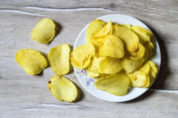 Картопляно-картопляні продукти, смажені картопляні чіпси — стокове фото