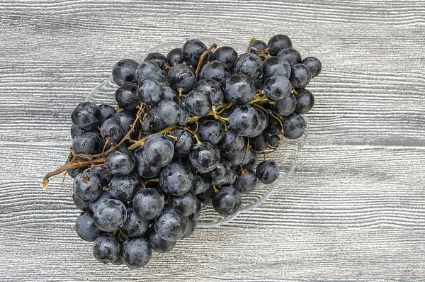 Fotos Uvas Negras Suelo Madera Las Uvas Negras Verdes Imágenes —  Fotos de Stock