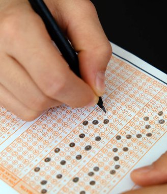 optik kağıt, işaretlenmiş soru seçenekleri ve optik sınav kağıdı,
