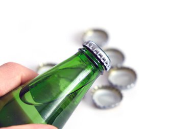 Maden suyu, doğal soda şişesi ve kapak.,