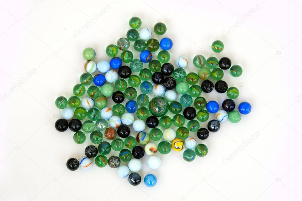 fun game for kids with colored glass marbles, glass balls,