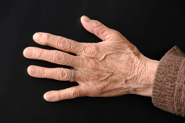 Covidien Virus Und Eine Ältere Menschliche Hand — Stockfoto