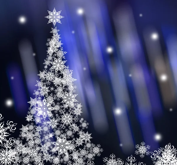 christmas tree at the blue abstraction background