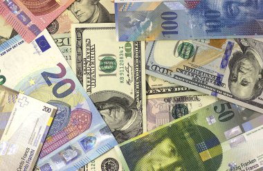 Para arka plan Amerikan Doları, euro ve İsviçre Frangı.
